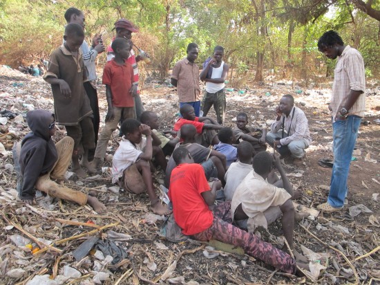 Morris conducting a counselling sessions with children still living on the street