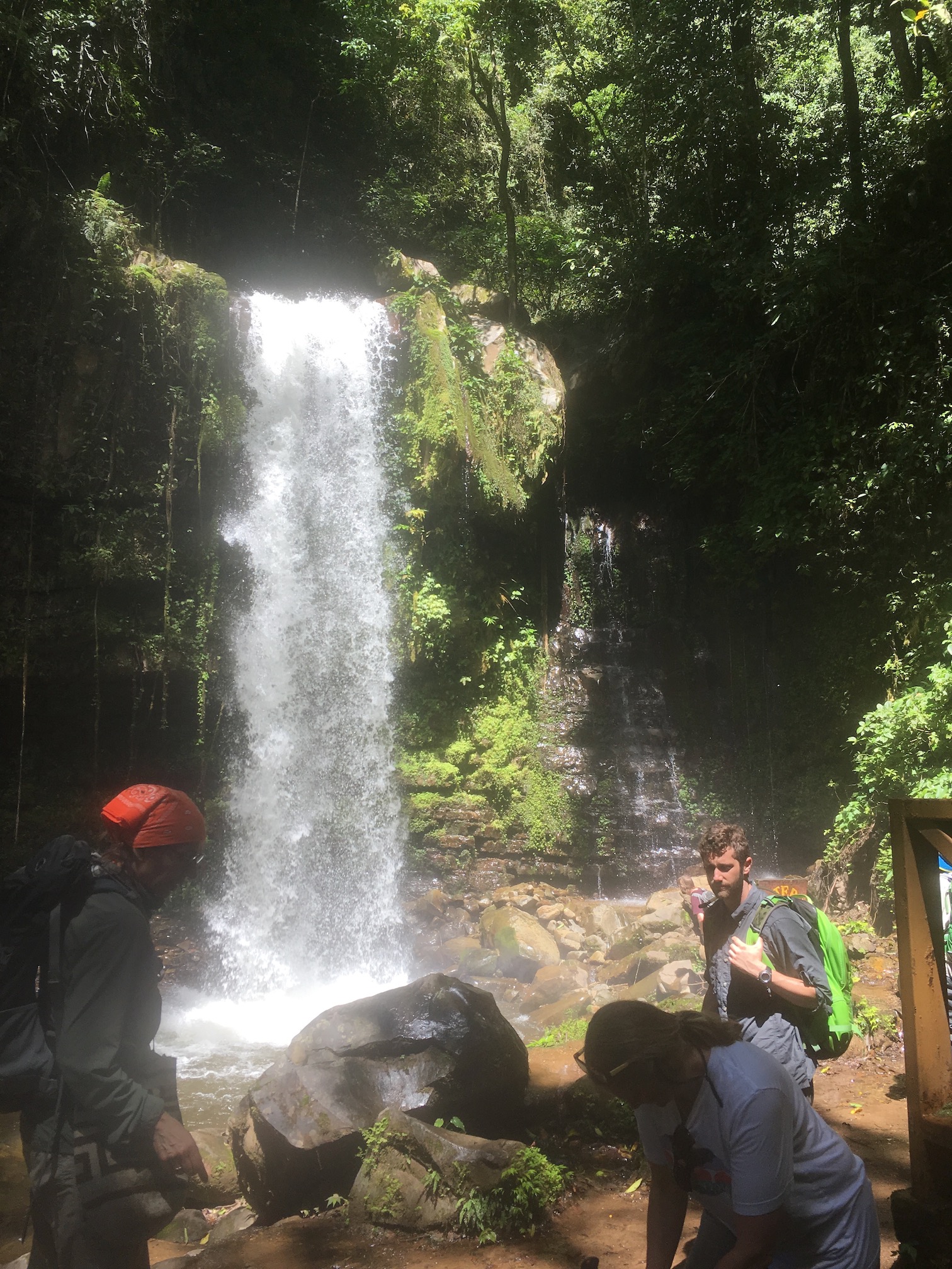 Collecting around a waterfall (Louise and Michael).